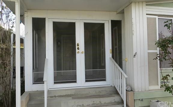 Enclosed Front Porch Entry...