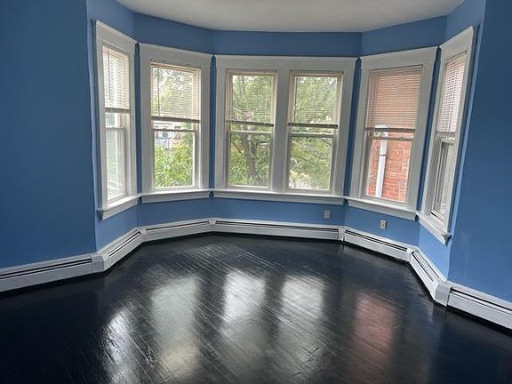 beautiful bowed windows in two of the very spacious front bedrooms. All windows have new blinds on them.