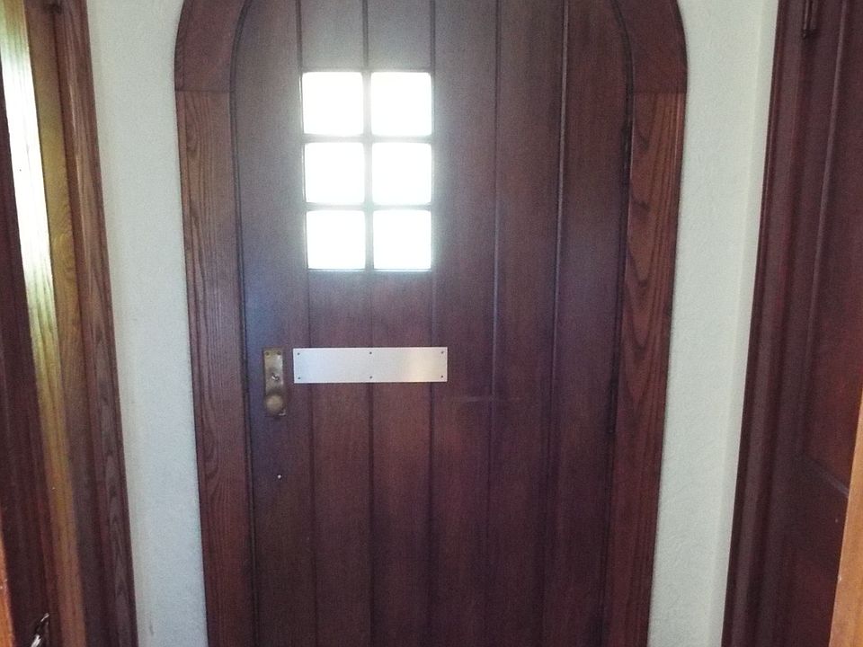 Front Door with two closets on either side