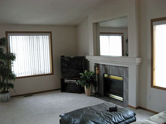 Open family room with gas fireplace