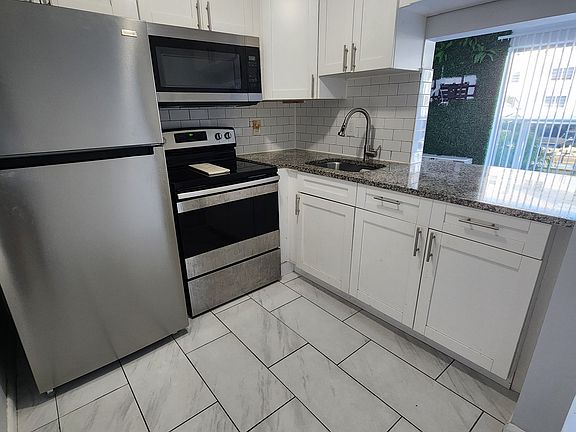 2nd image of 3868 NE 169th St #111