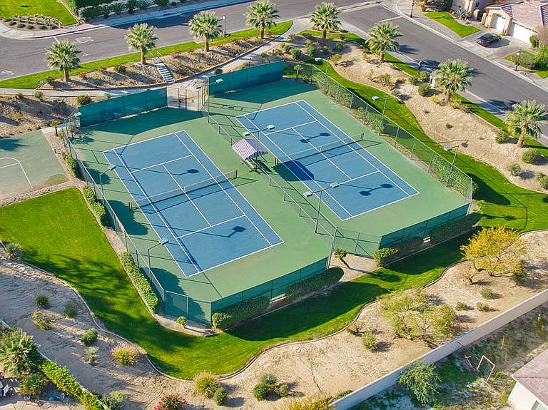 THERE ARE TENNIS COURTS IN THE VERSAILLES COMMUNITY IN THE CITY OF RANCHO MIRAGE