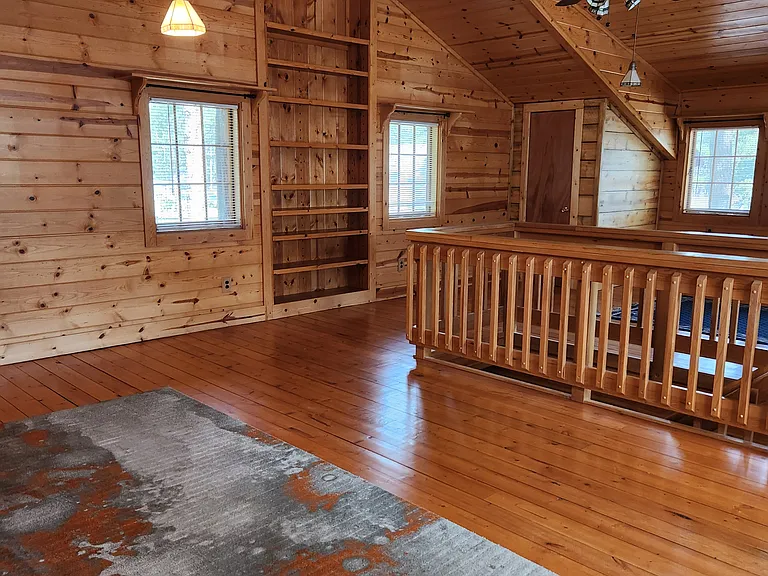 The massive bedroom space is very inviting.