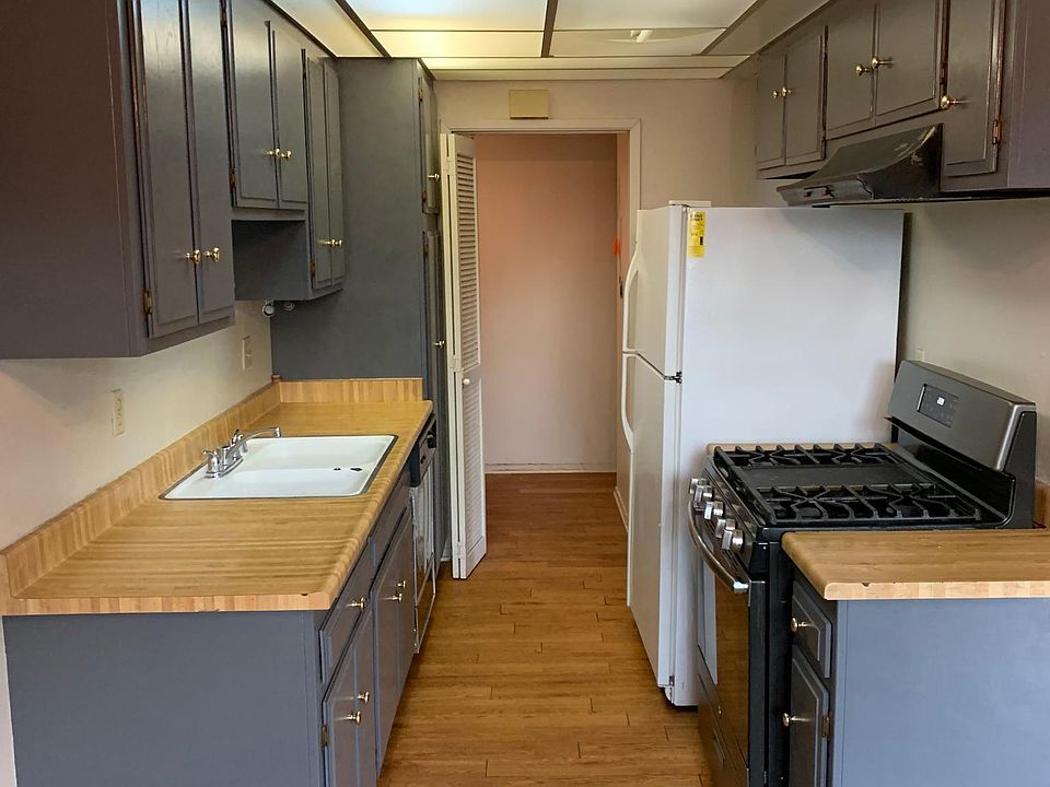 Standing in dining room looking at kitchen and laundry room.