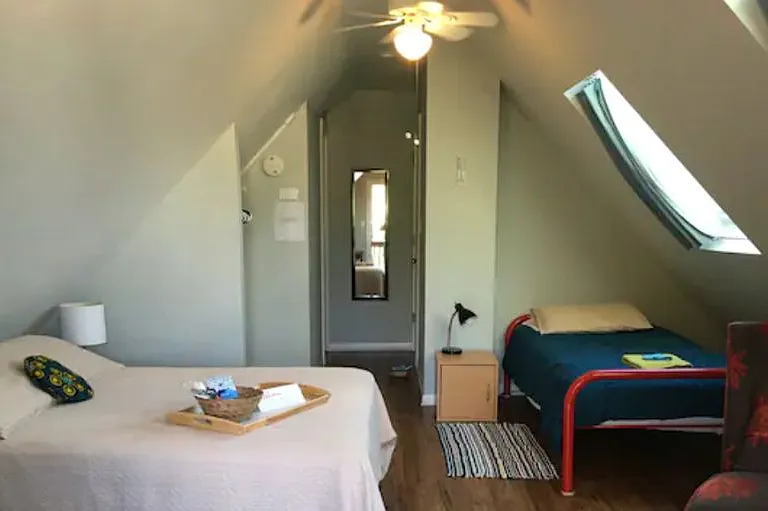 Master bedroom - an alternate set up with a double bed and twin bed shown