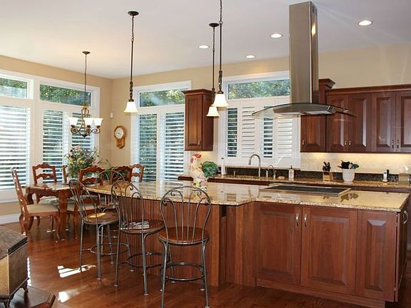 The kitchen/breakfast area is delightful! Recently remodeled by Wright builders including new cabinetry, stainless appliances,new hardwood flooring, granite, and lighting! 