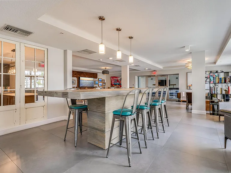 Shared Resident Lounge with High-Top Seating and Lounge Areas