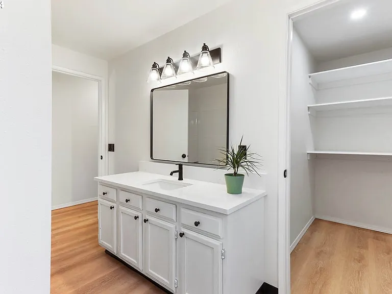 Upstairs bathroom with large linen closet