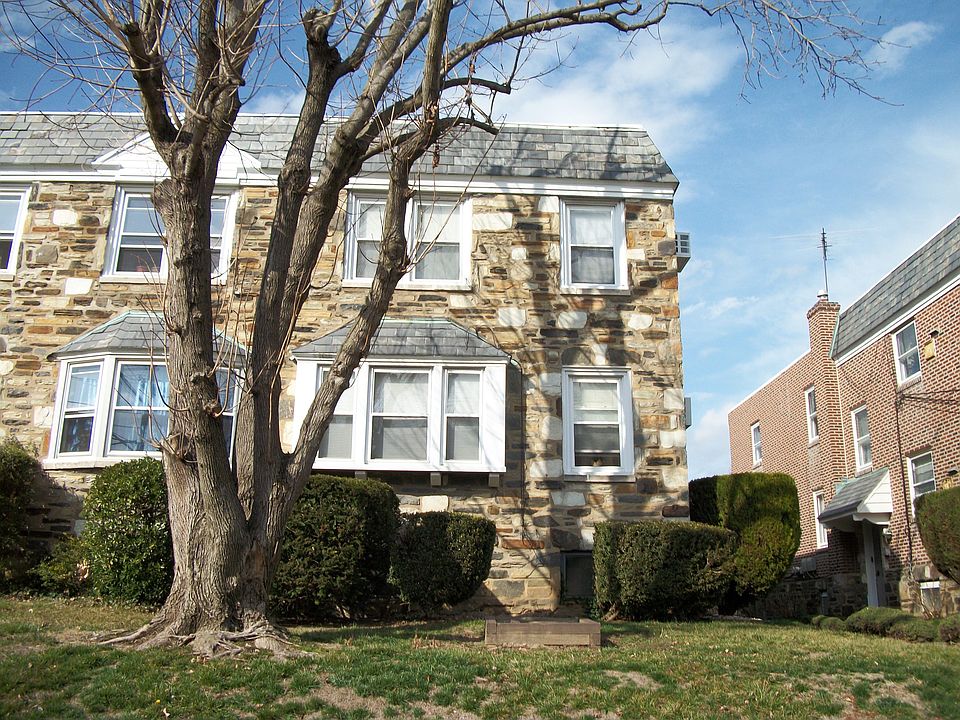 2 story brown stone/brick duplex