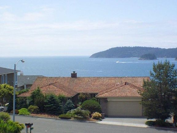 "All our neighbors homes are very well kept & beautifully landscaped visually tying the yards togeth