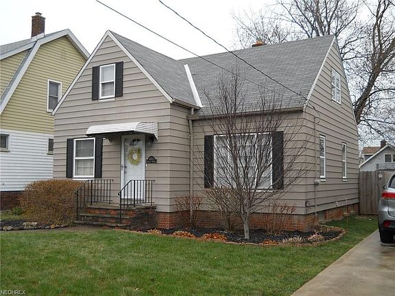 Professionally landscaped front and back yards.