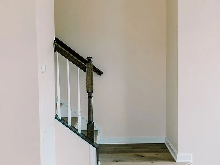 View of stairs to 3rd floor from living room