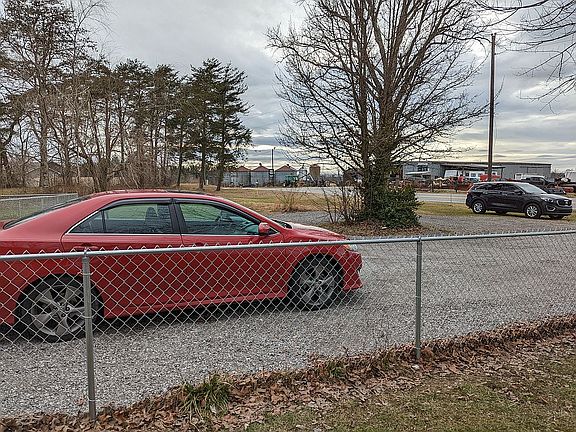 Fenced in yard, double gate drive