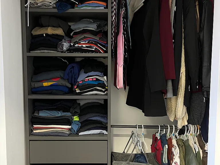 In-wall closet (clothes illustrative only)