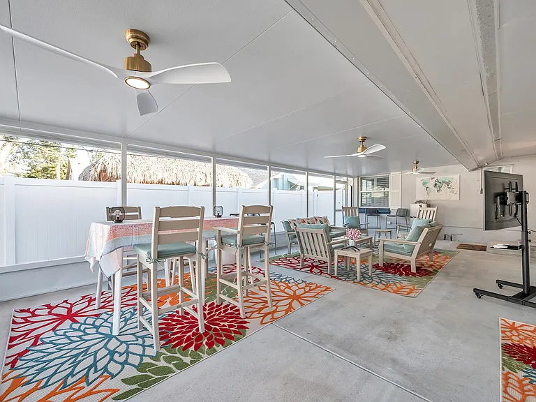 very spacious lanai with TV, games, fans