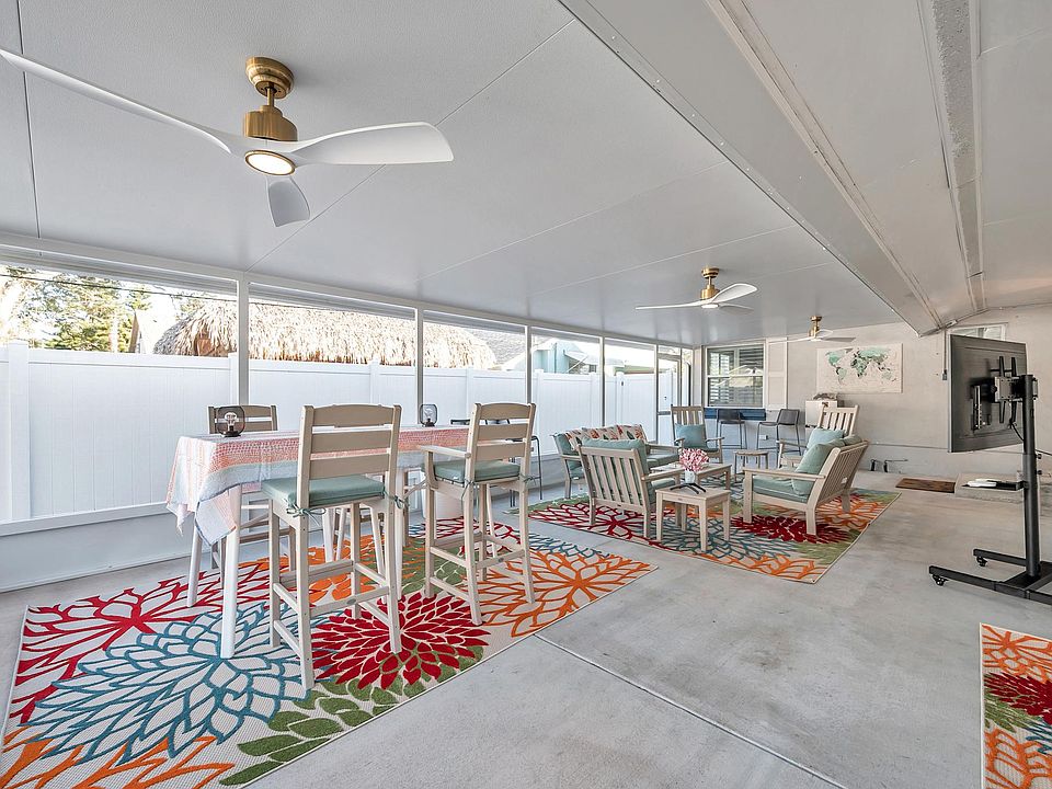 very spacious lanai with TV, games, fans