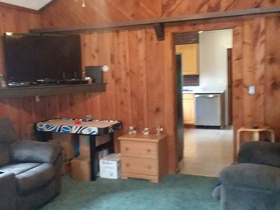 Living room with vaulted ceiling