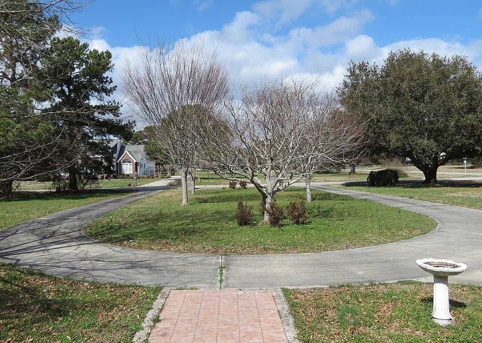 Driveway is gracious and convenient