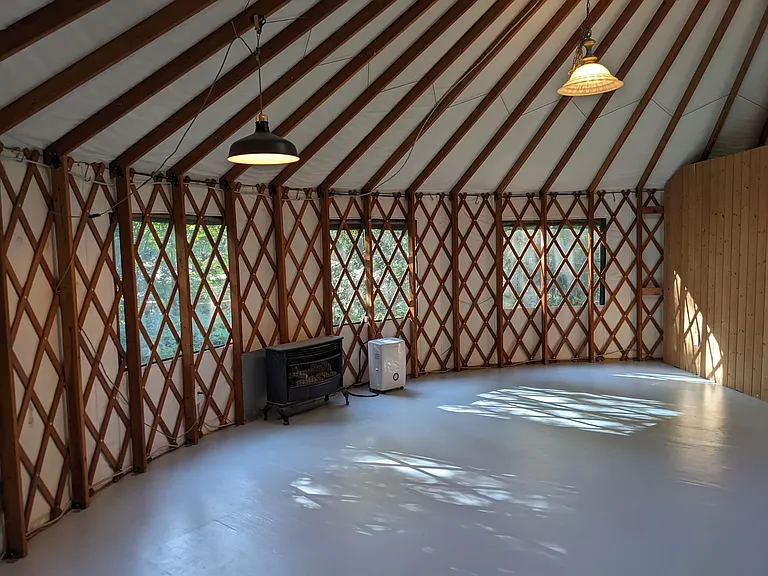 Living room with propane stove.