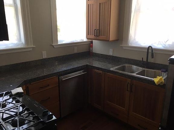 Gas Range, tall windows, lots of natural light