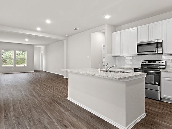 Kitchen to Dining and Family Room