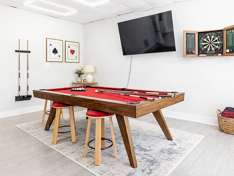 Modern game room with pool and darts