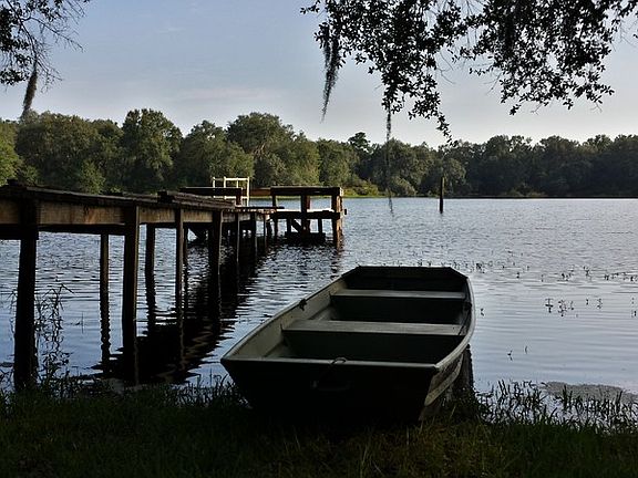 Standing outside the backdoor.
