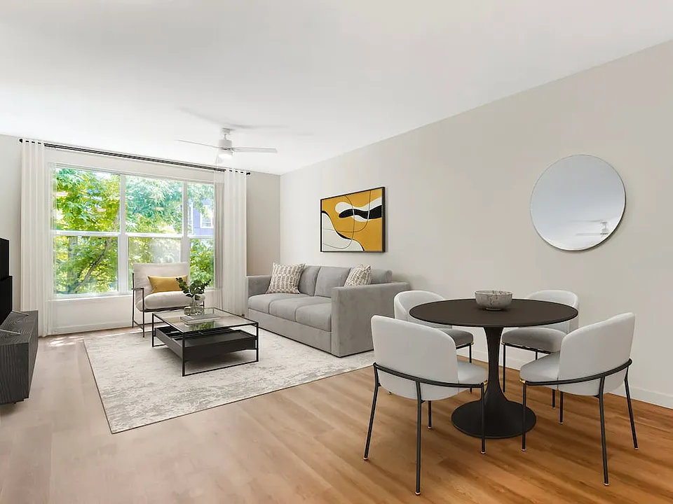 Renovated Package I dining and living room with hard surface flooring (in select homes)