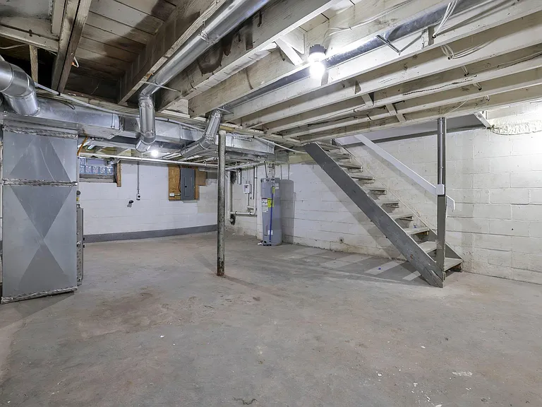 Basement with utilities which are placed strategically to enable you to enjoy your living space upstairs!