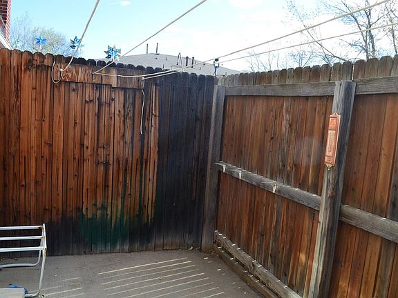 Enclosed back patio area