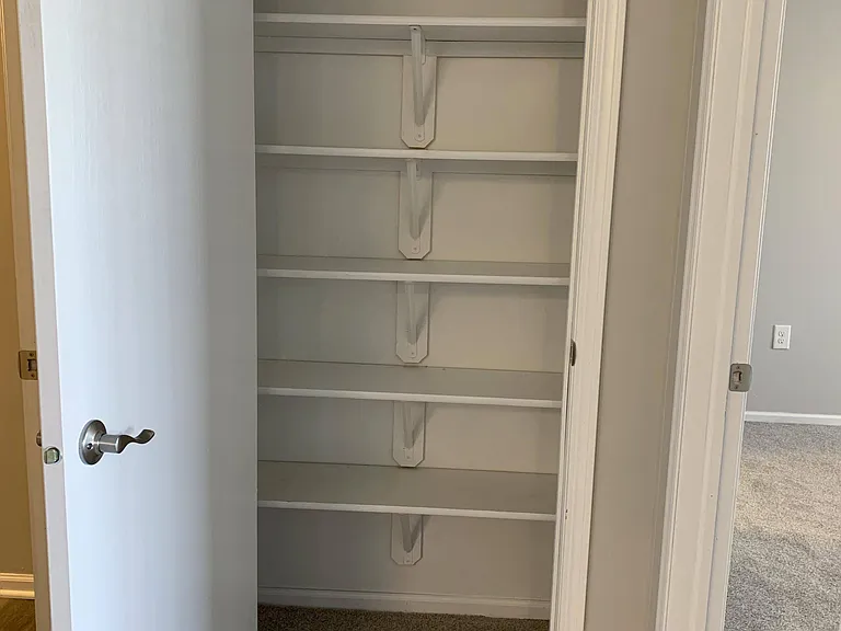 Keep your kitchen essentials perfectly organized with built-in pantry shelving.