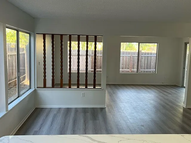 Kitchen/dining room looking into rear family room