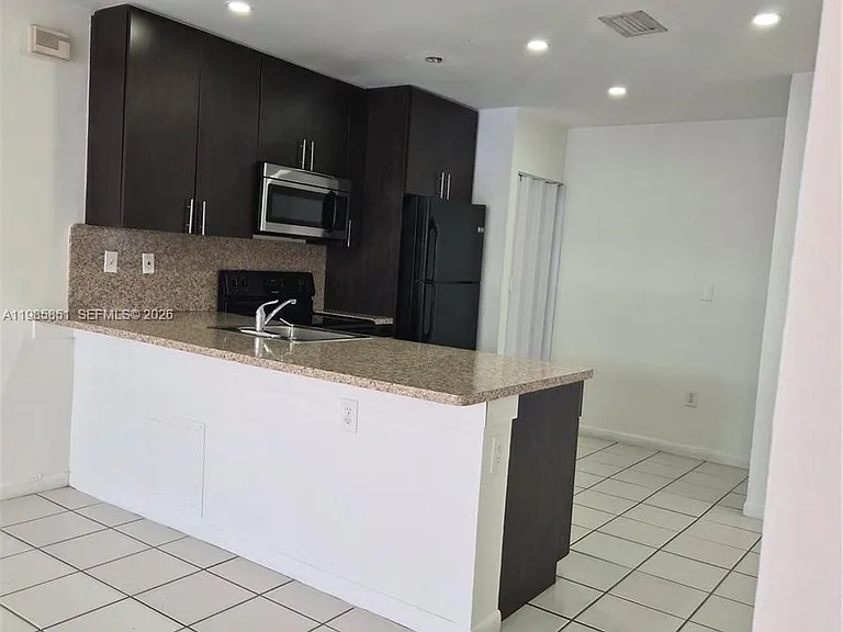 15421 SW 81st Circle Ln #24 — Photo 1