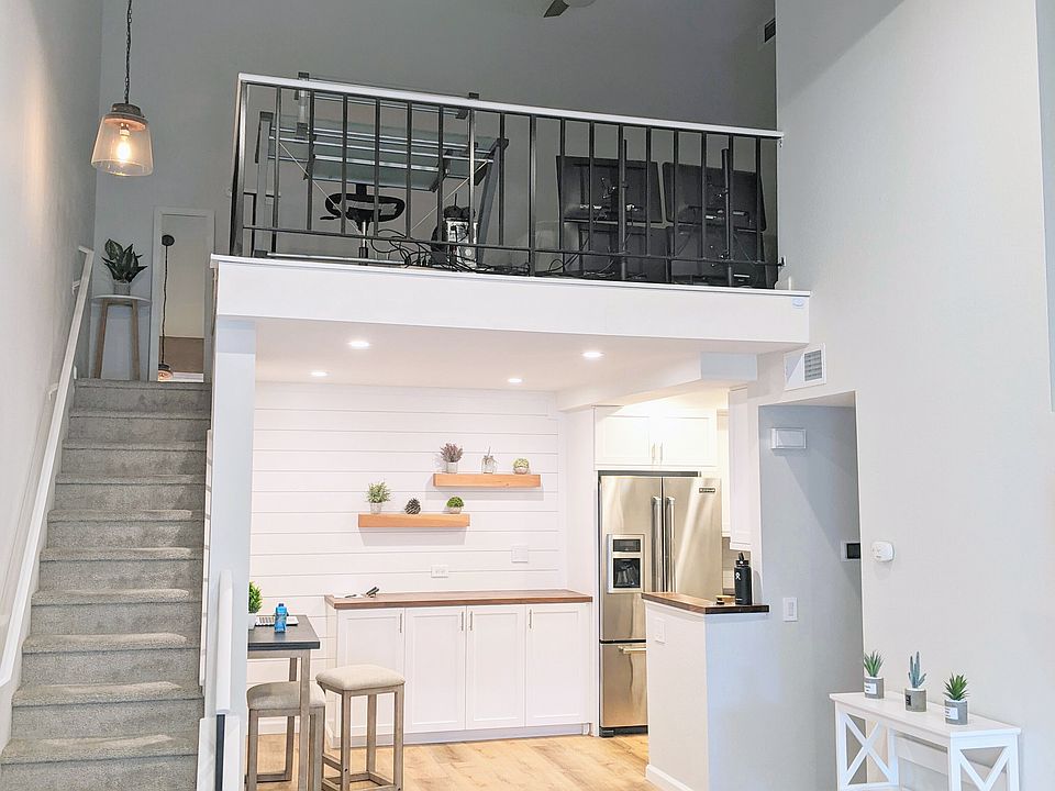 Stairs to the large 2nd bedroom loft/office