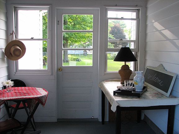 simple breezeway? 3-season porch? mudroom?  Wonderful extra space!
