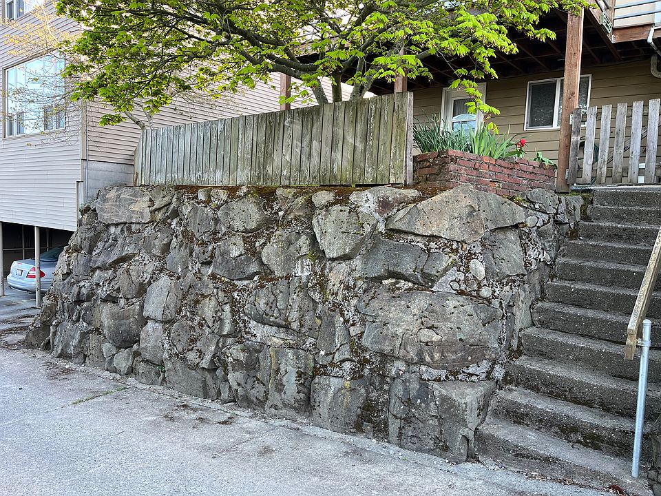 Second entrance, steps from alley to lower unit.