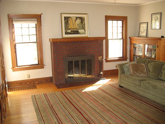 living room with built in bookcase