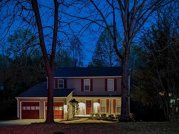 Front, nighttime. Automatic dusk to dawn LED lights.