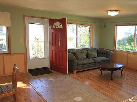 Open living area with large windows for light.