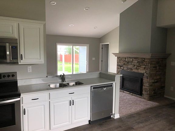 Open floor plan with new appliances.