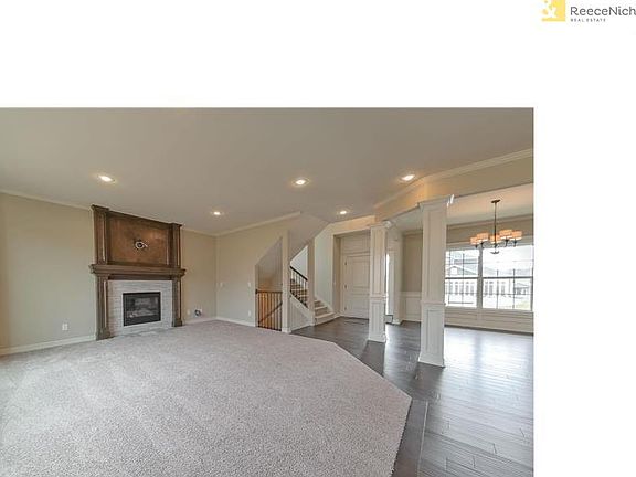 Great Room with oversized gas direct vent sealed until fireplace. Pre-wired for 5-speaker surround sound, security and HDMI under 10'.