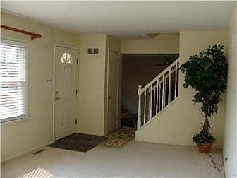 Front door entryway into Living room