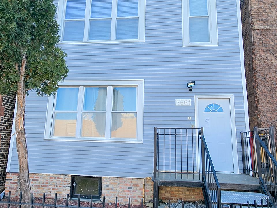 Front of house, apartment is on first unit