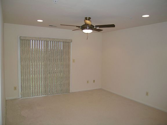 LR w/ceiling fan plenty of wall space for larger wall unit  