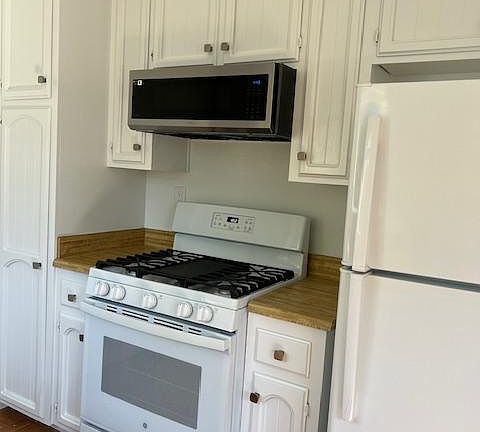 New gas stove and new microwave.