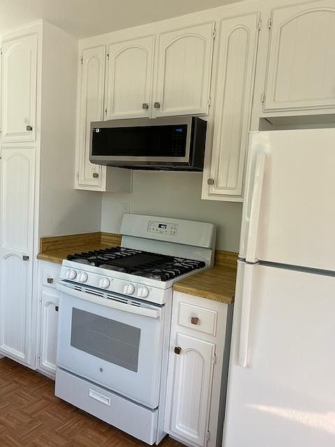 New gas stove and new microwave.