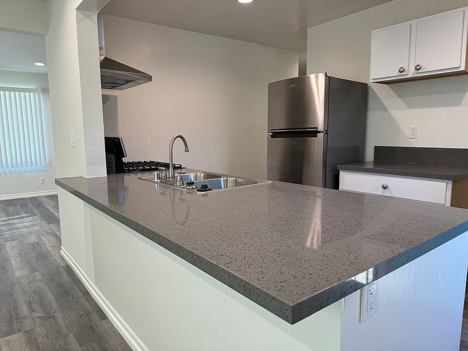 Fabulous counter space for food preparation and entertaining. Add some bar stools to keep the chef company.