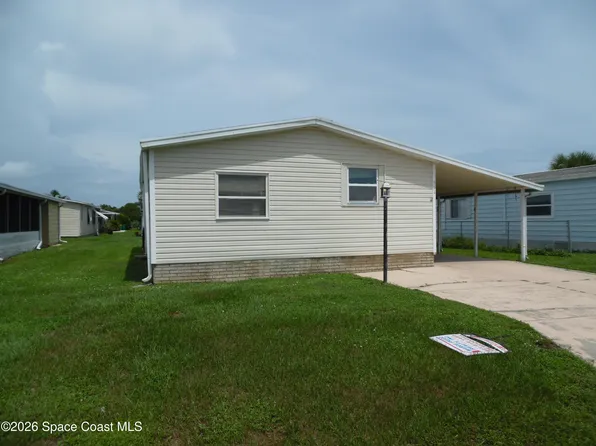 514 Puffin Dr, Barefoot Bay, FL 32976