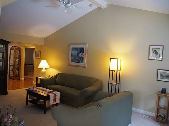 Vaulted ceilings add dramatic space to this living area.