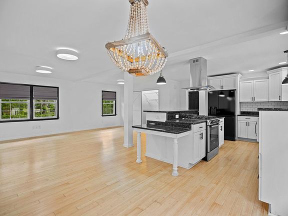 Kitchen opens to living room